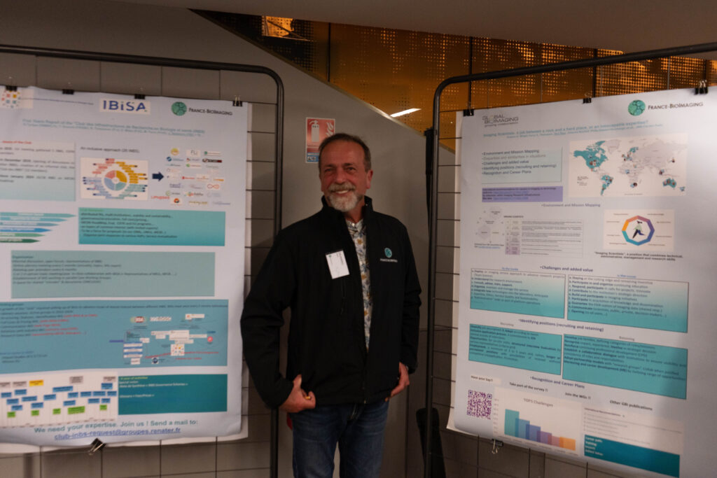 Jean Salamero at the France-BioImaging Annual Meeting, with a poster about international engagement at France-BioImaging.