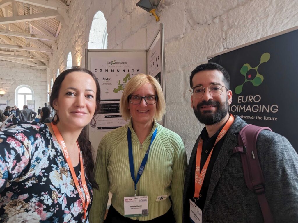 Alexandros at EMIM 2024 with Euro-BioImaging Hub team members. 