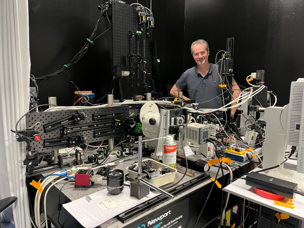 Julien Colombelli, Head of the imaging facility at IRB, with the open source hardware Lego-based lightsheet microscope, LEMOLISH.